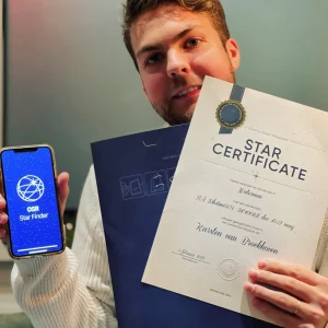 Man Displaying Certificate